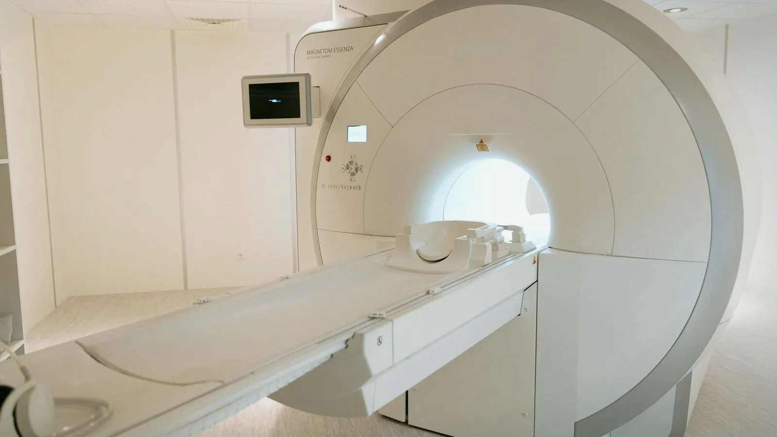 A ring-shaped treatment scanner with an empty patient table