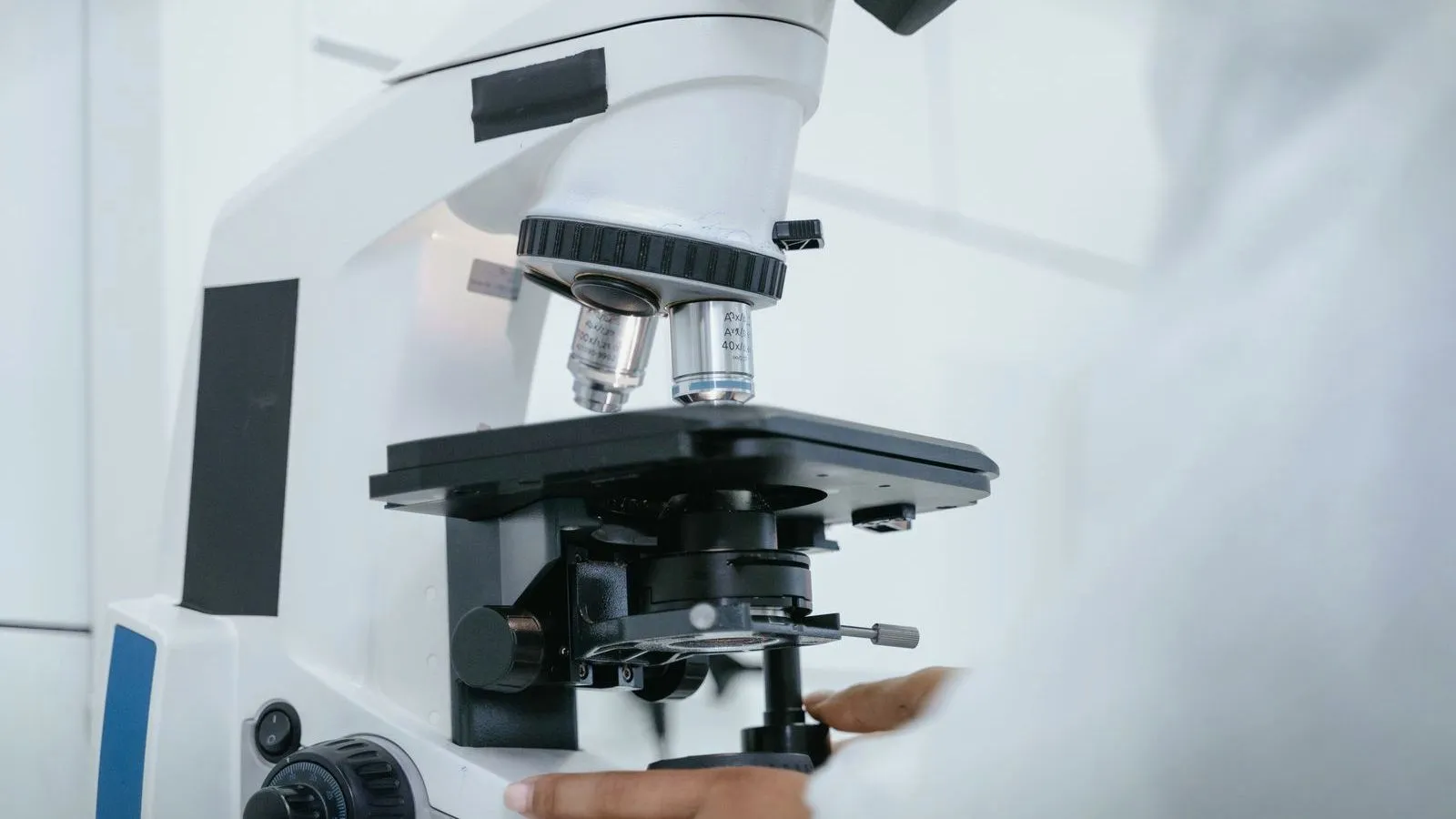 A laboratory microscope on a bench
