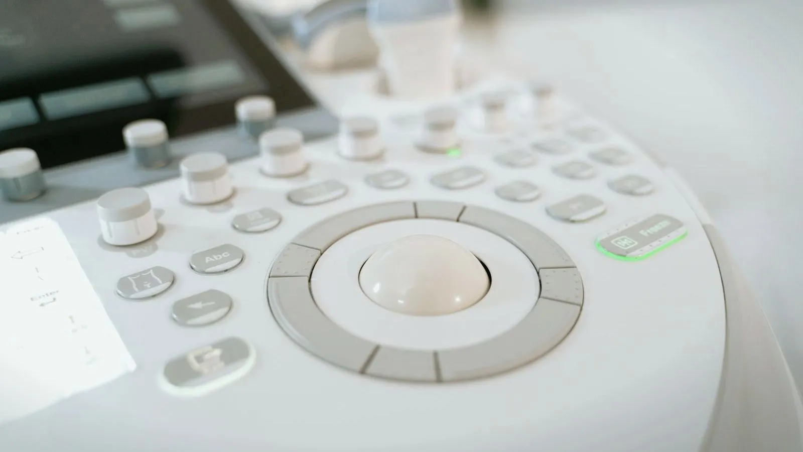 The control panel of an ultrasound machine, with trackball and dials